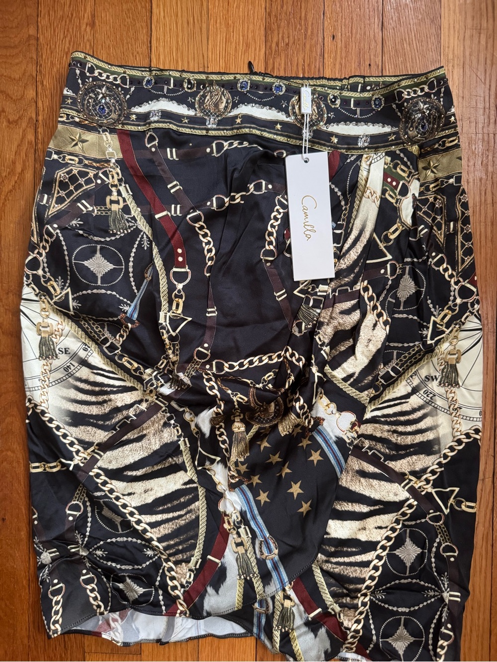 Camilla cross over draped mini skirt in boss of the brumbies size M